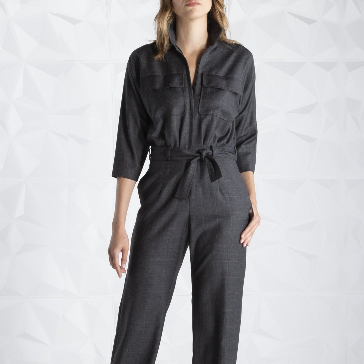 Grey Jumpsuit on model - Darby Scott