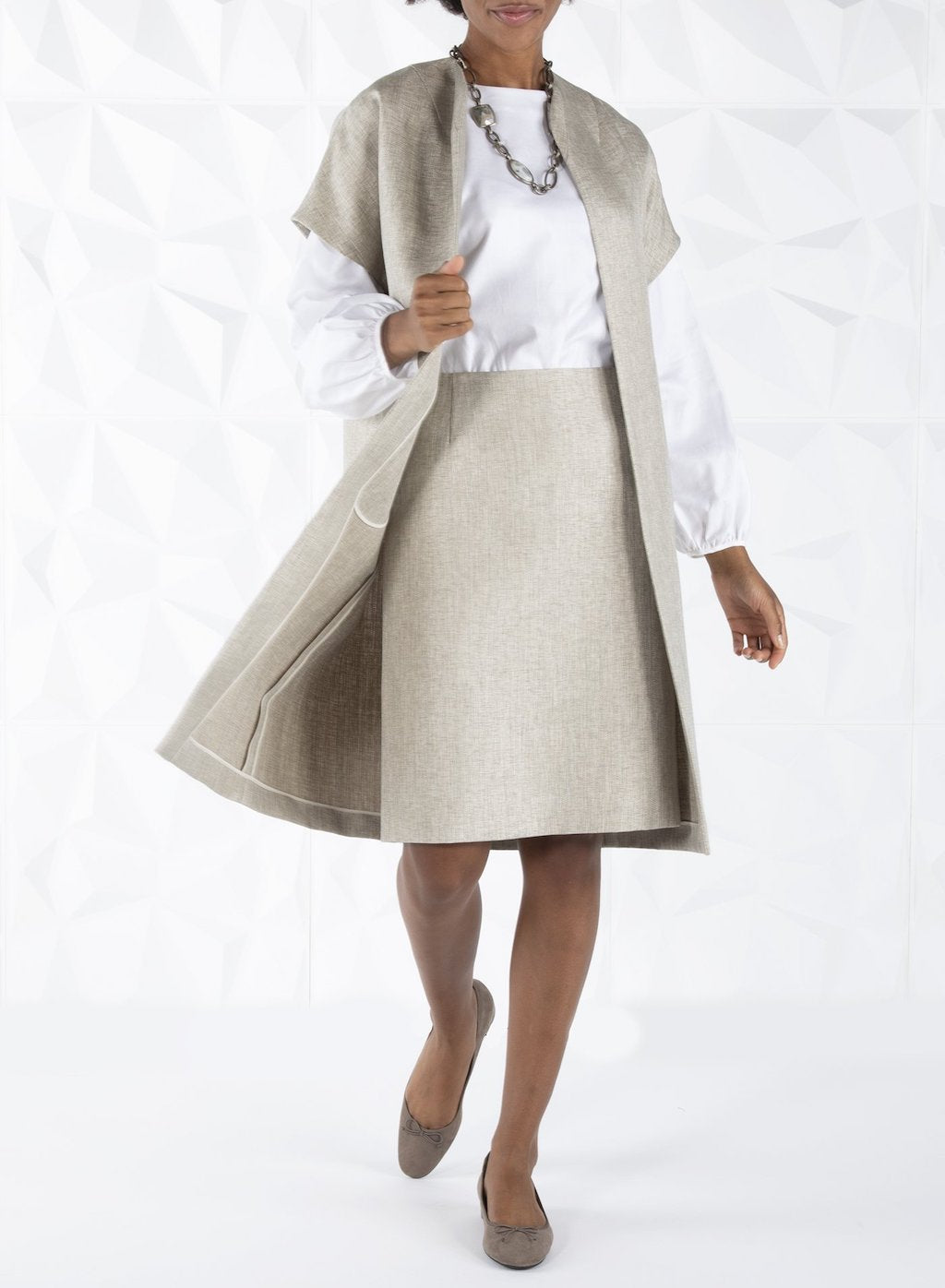 Topper Coat & white long sleeve blouse on model - Darby Scott