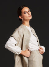 Close up of Topper Coat, Pencil Skirt & white blouse on model - Darby Scott  