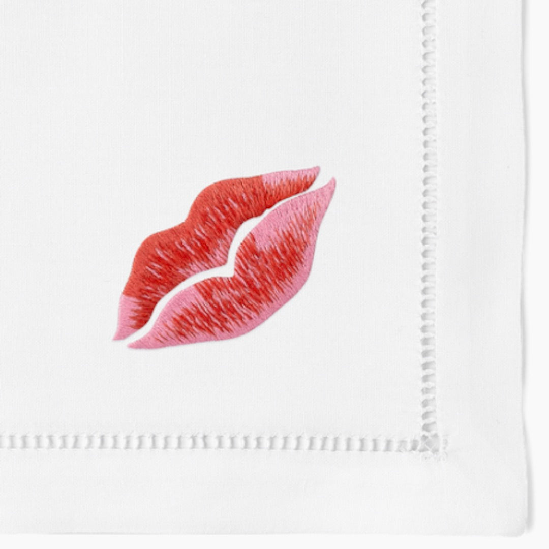 Embroidered red lips on cotton napkin