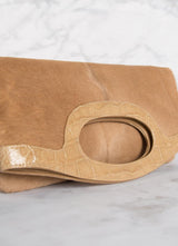 Close up of handle on Cafe Haircalf Convertible Clutch - Darby Scott 