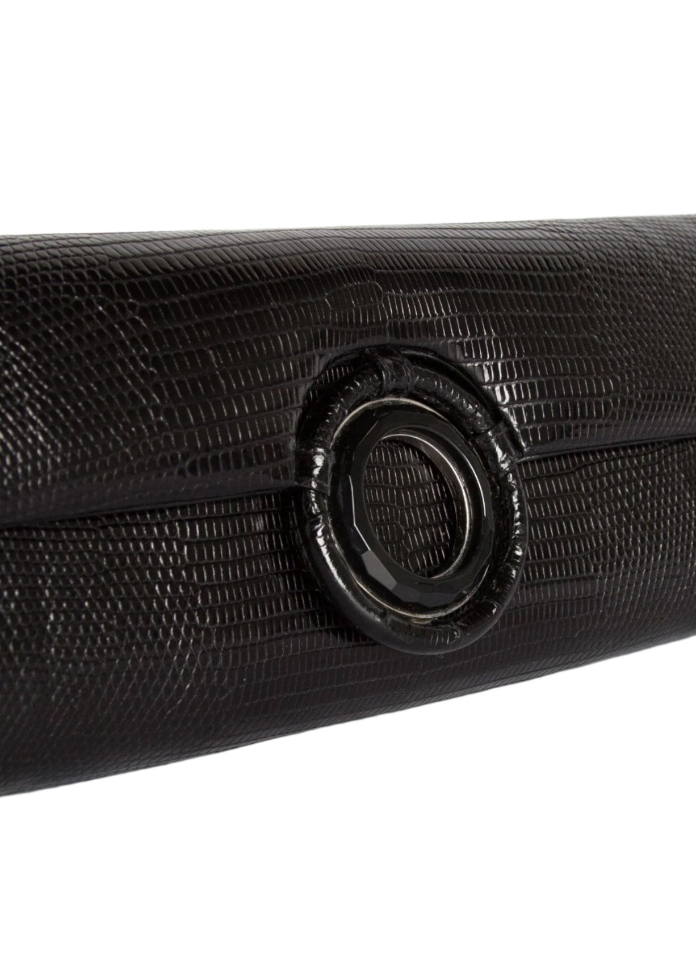 Detail view of Black Onyx Grommet on black lizard clutch - Darby Scott 