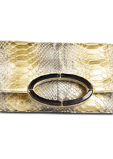 Close up view of smokey topaz handle on gold python clutch - Darby Scott 