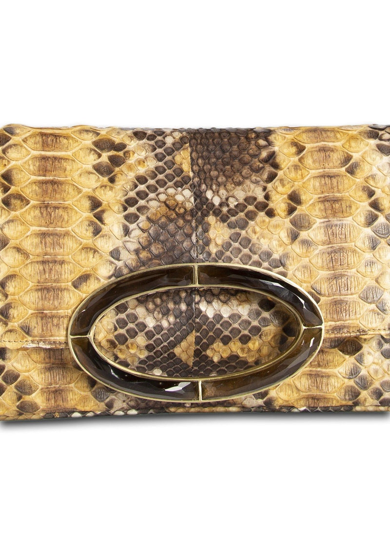 Close up view of smokey topaz handle on gold & brown clutch - Darby Scott 