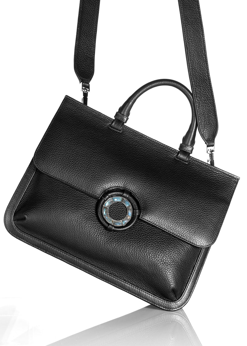 Crossbody strap attached to black leather top handle grommet saddle bag - Darby Scott