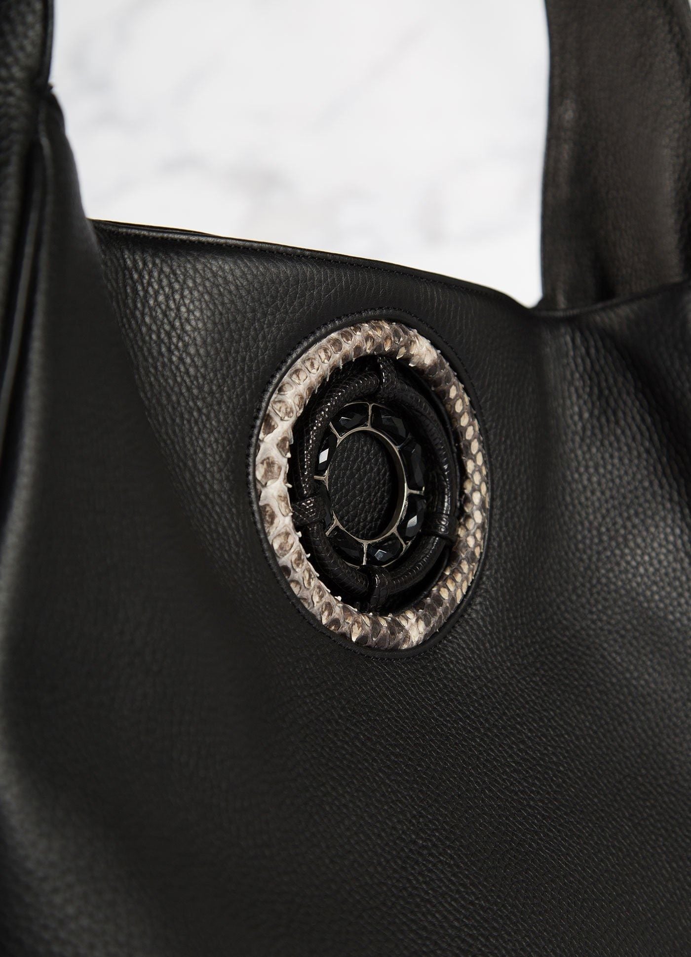 Detail of Black Onyx Grommet on Black Leather Paige Hobo - Darby Scott