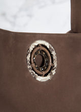 Detail of Smokey Topaz Grommet on Light Brown Suede Paige Hobo Tote - Darby Scott