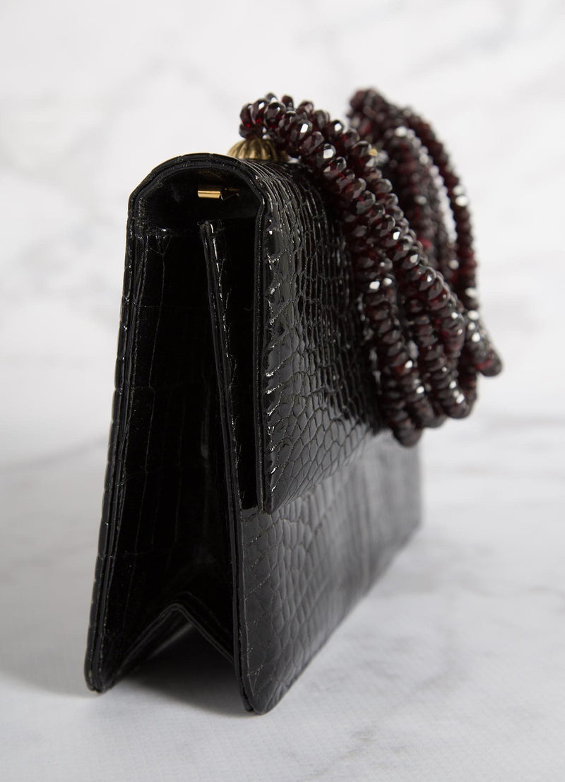 Side view of Black Crocodile and Garnet Necklace Handbag - Darby Scott