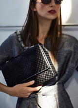 Model holding Black Embossed Haircalf Chain & Jewel Shoulder Bag - Darby Scott