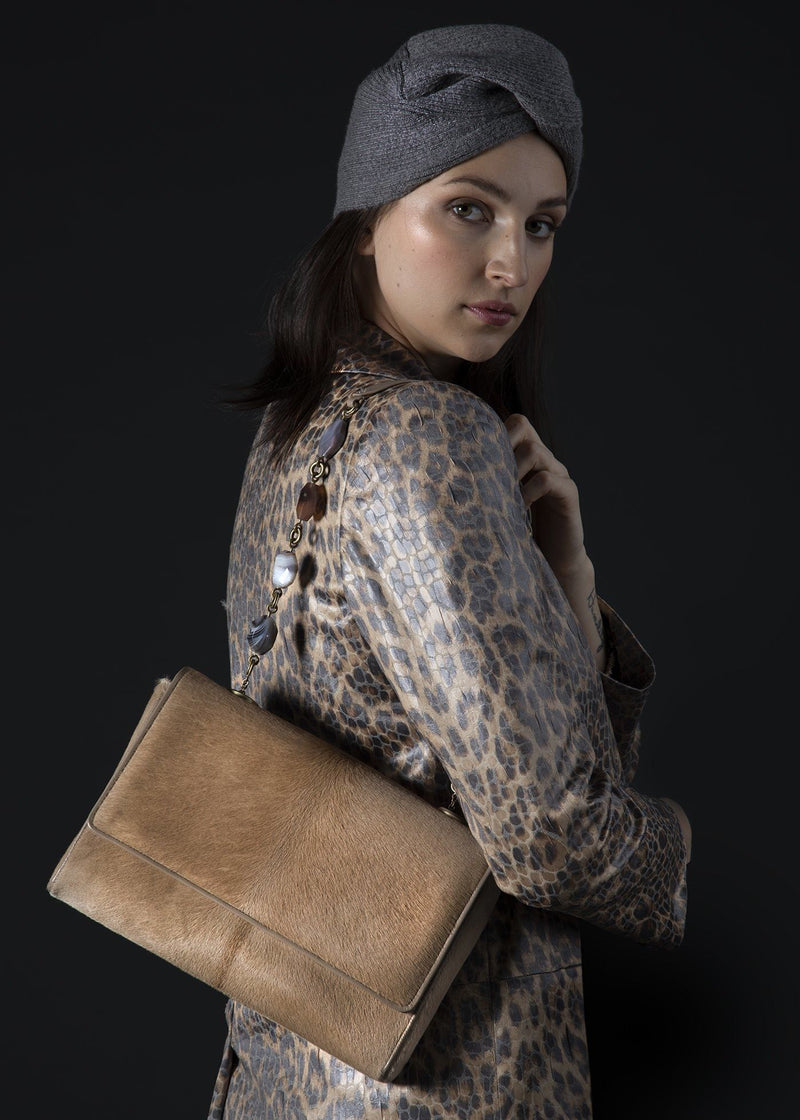 Model with Tan Haircalf Chain & Jewel Shoulder Bag on her shoulder - Darby Scott