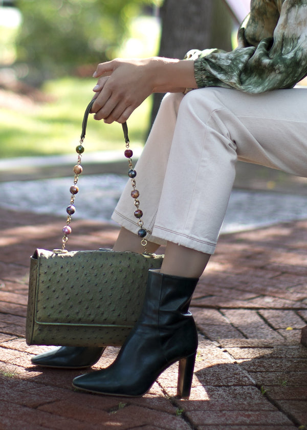 Chain & Jewel Olive Handbag held by Model - Darby Scott