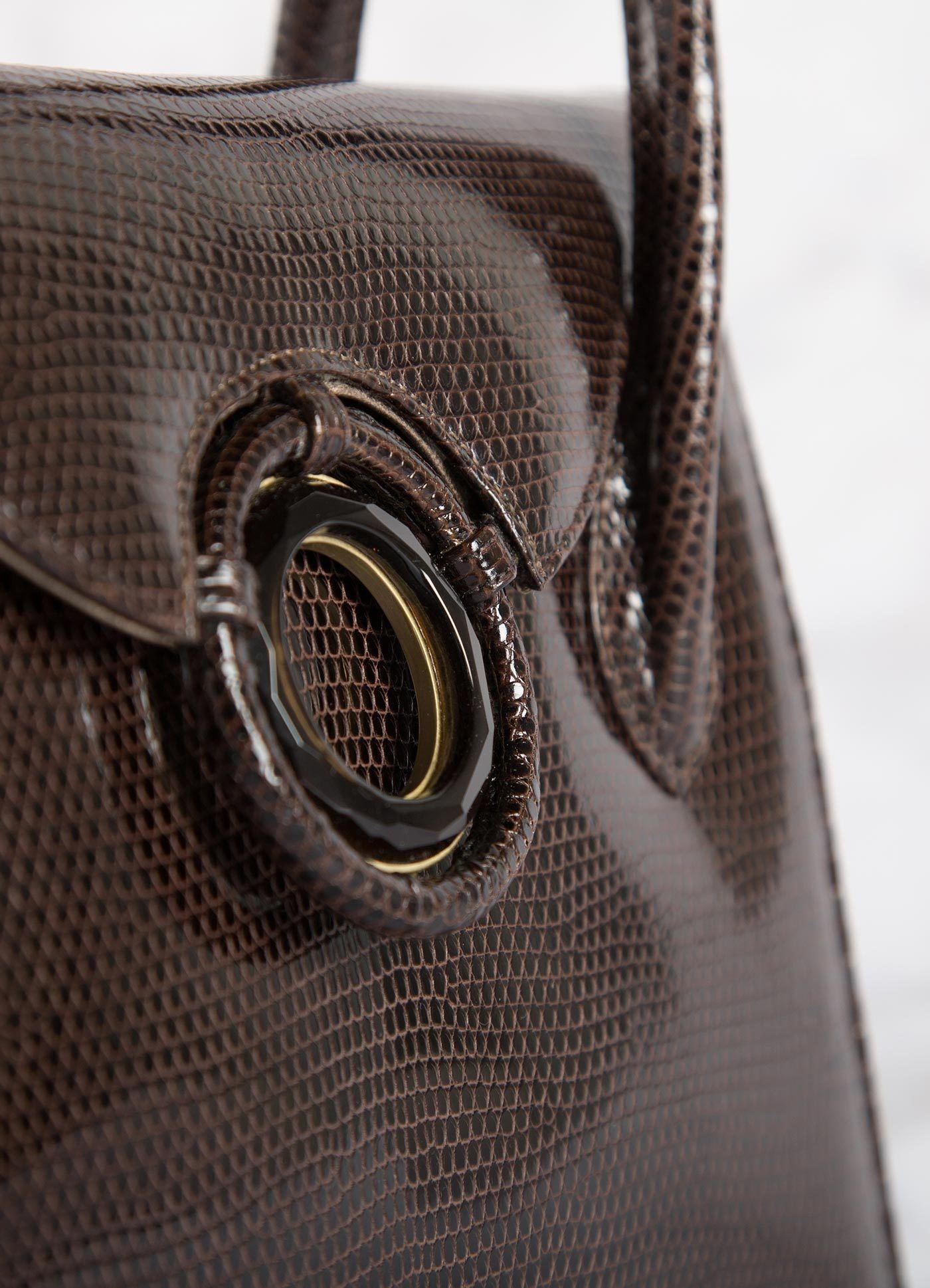 Detail of Smokey Topaz Grommet on Brown Lizard Thompson 'O' Tote- Darby Scott