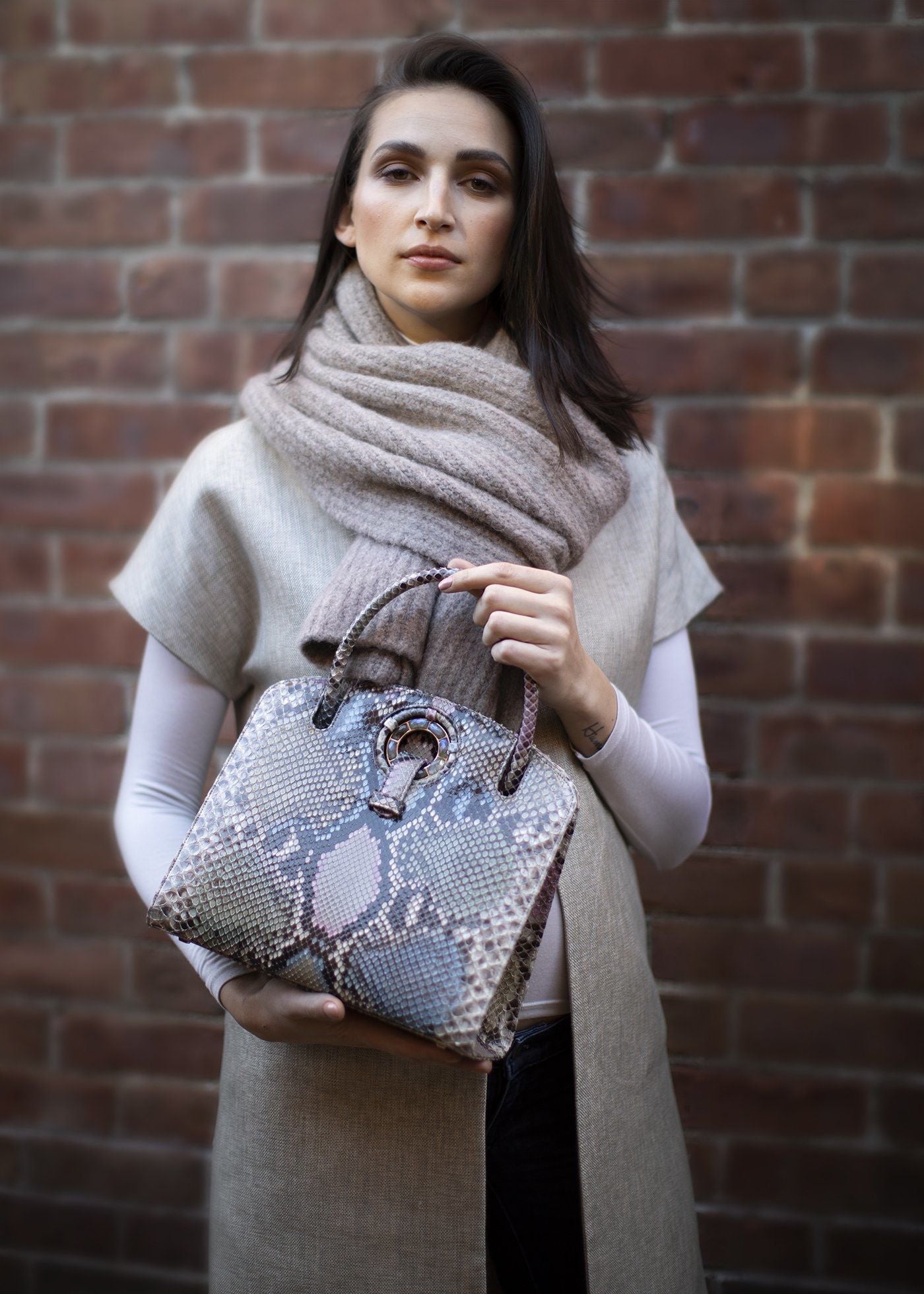 Pastel Annette Top Handle Tote held by a model - Darby Scott