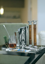 Candlesticks, Pitcher and Mixing Glass with Spoon on Bar Cart
