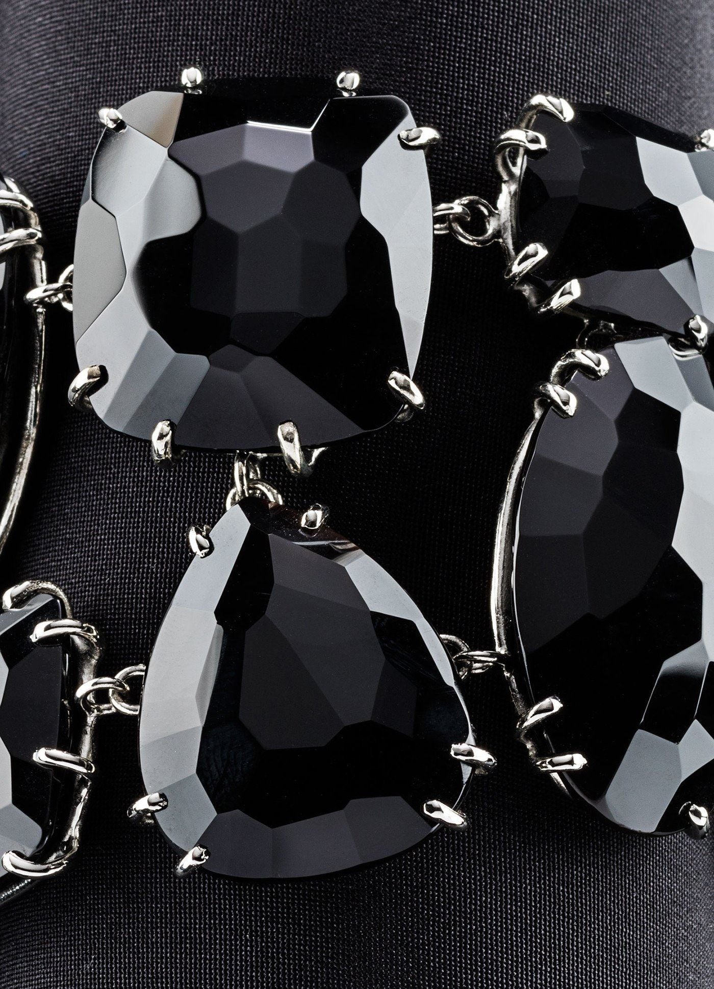 Detail of prong set black onyx cabochon bracelet - Darby Scott