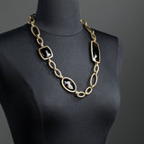 Smokey Topaz & Antiqued Brass Chain Link Necklace on Mannequin - Darby Scott