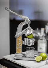Citrus Juice on Marble Counter with Limes