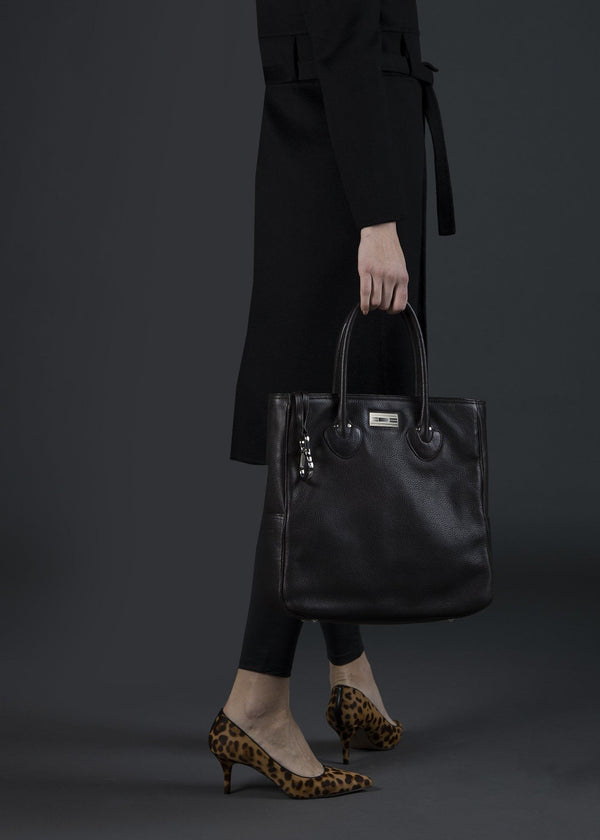 Model carrying Brown Leather Essex Tote - Darby Scott