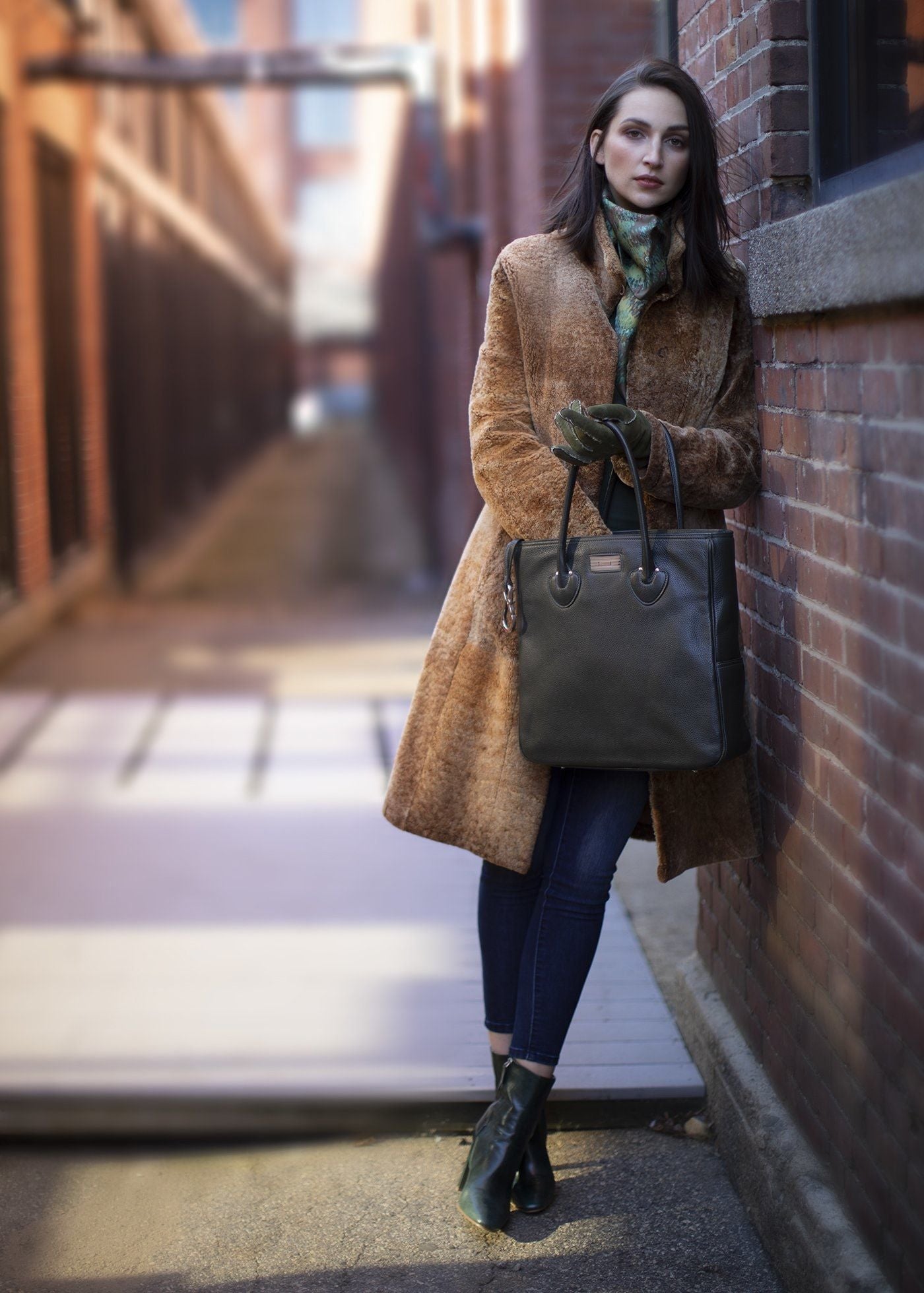 Model with Dark green leather Essex monogram tote - Darby Scott