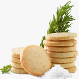 Rosemary shortbread cookies with sprigs of rosemary and sea salt