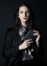  Model in Abstract Plaid Silk Scarf with a black python art deco clutch - Darby Scott